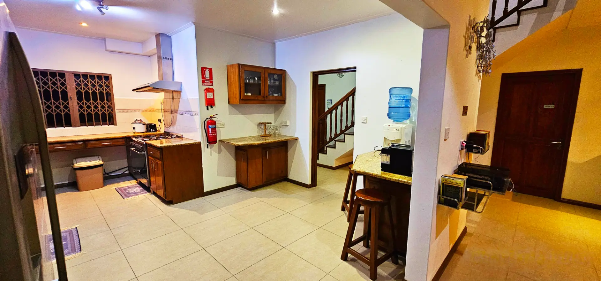Shared kitchen — gas hob, coffee station and filtered water