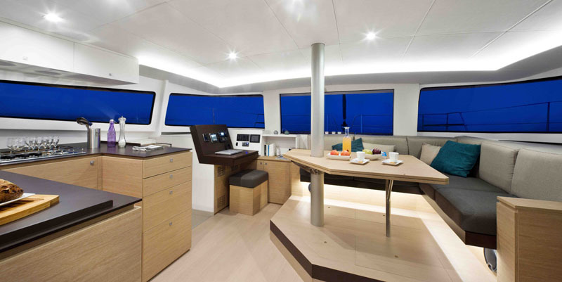 Bright premium catamaran saloon with panoramic blue windows
