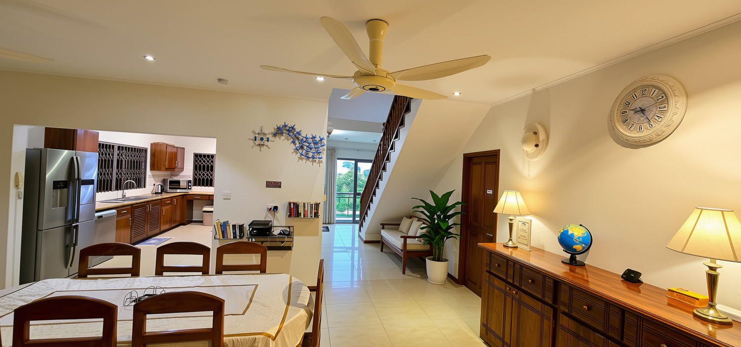 Open-plan dining & kitchen with staircase to first floor